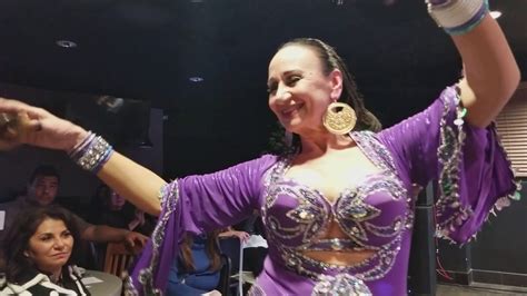 helena vlahos|Mesmerizing Belly Dance: Watch Helena Vlahoss Famous Nine。